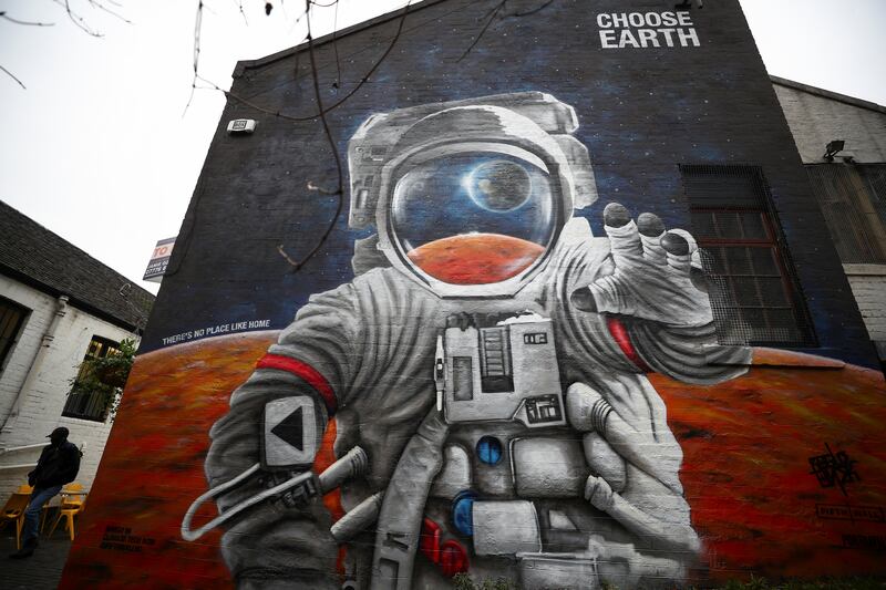 A 'Choose Earth' mural on a gable end in Glasgow. Reuters