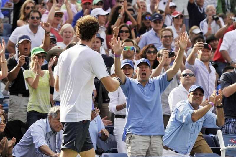 Andy Murray of Great Britian (6) wins against Tomas Berdych of the Czech Republic (3) during their 2012 US Open men's singles semifinals match at the USTA Billie Jean King National Tennis Center in New York on September 8, 2012. Murray, the Olympic champion, advanced to the US Open final by defeating Berdych 5-7, 6-2, 6-1, 7-6 (9/7).     AFP PHOTO / TIMOTHY A. CLARY

