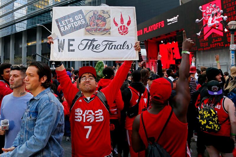 A fan holds a sign ahead of the start of the NBA Finals. Reuters