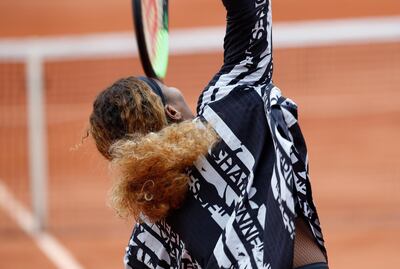 Serena Williams of the U.S. wears a jacket with French text reading "Champion", "Queen", "Godess", and "Mother" during warm-up prior to her first round match of the French Open tennis tournament against Vitalia Diatchenko of Russia at the Roland Garros stadium in Paris, Monday, May 27, 2019. (AP Photo/Pavel Golovkin)