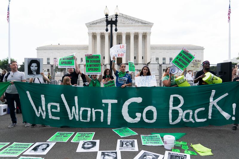 Abortion rights activists gather outside the US Supreme Court in Washington on June 24, 2022. AP