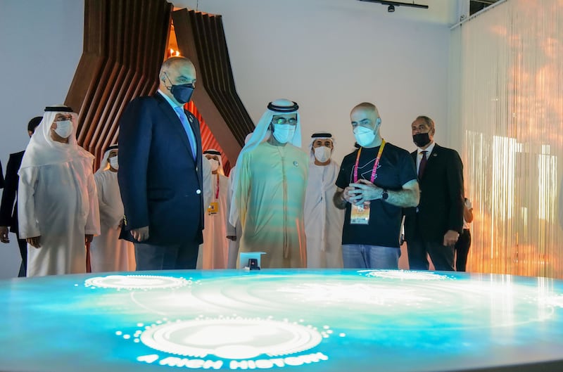 Sheikh Mohammed visits the Jordan pavilion, accompanied by Jordan's Prime Minister Bisher Al Khasawneh, front, left.