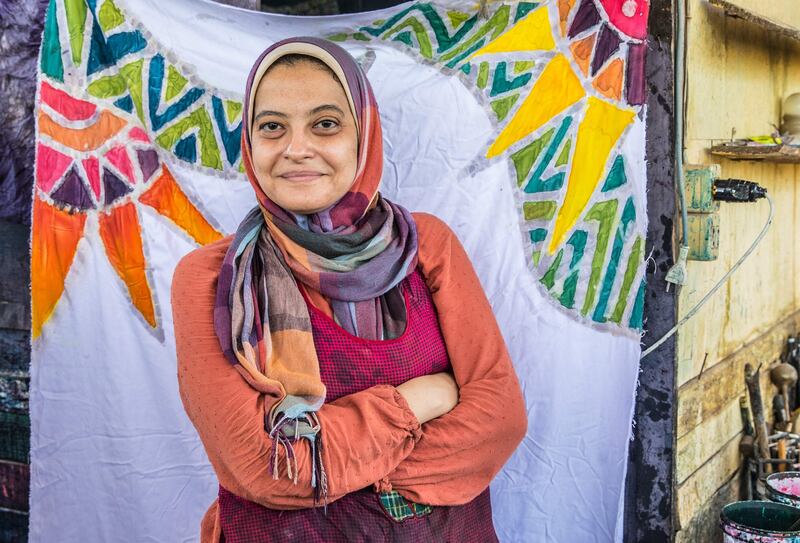 A smiling Samar Hassanein at her workshop in Old Cairo.