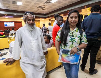 Abu Dhabi, U.A.E., August 26 , 2018.  Visa violators who have been trying to take advantage of the amnesty at the Tas-Heel Centre at Al Raha Mall. - -  (R)  Marissa Espiritu, a caregiver from the Philippines patiently waits for her number to be called at the Tas Heel Centre.
 Victor Besa/The National
Section:  NA
Reporter:  Haneen Dajani