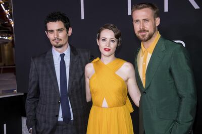 Damien Chazelle, left, Claire Foy and Ryan Gosling attend the "First Man" premiere at the National Air and Space Museum of the Smithsonian Institution on Thursday, Oct. 4, 2018, in Washington. (Photo by Charles Sykes/Invision/AP)