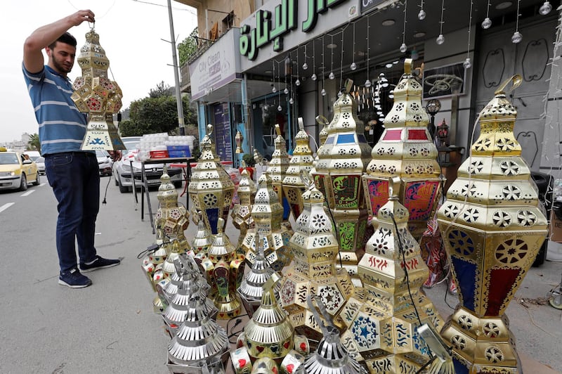 A Palestinian vendor displays lanterns for sale ahead in Nablus. Reuters