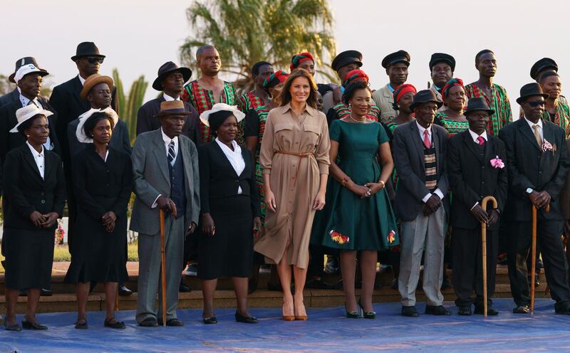 Melania Trump, Malawi first lady Gertrude Maseko and performers gather for photographs after a ceremony at the State House, in Lilongwe, Malawi. Carolyn Kaster / AP Photo