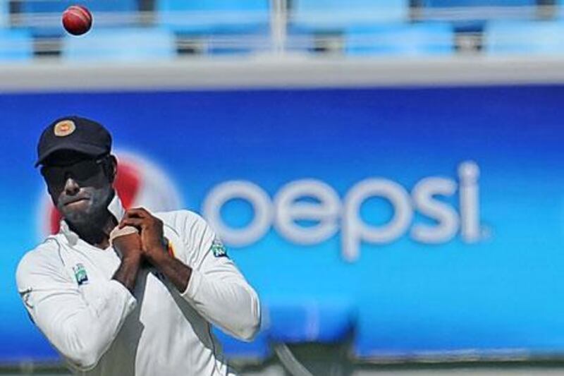Sri Lanka’s Angelo Mathews drops a catch off Pakistan’s Saeed Ajmal in Dubai on Friday.