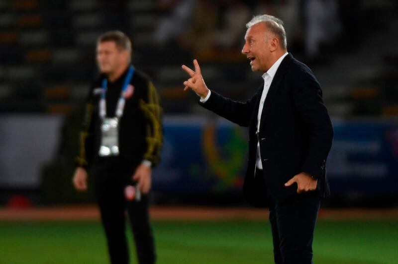 United Arab Emirates' coach Alberto Zaccheroni, right, gives his instructions. AFP