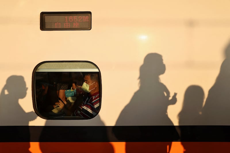 Travellers wait at Taichung high-speed rail station for services delayed by the quake to resume. Reuters