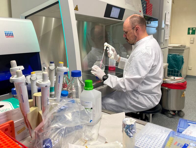 Roman Woelfel, head of the Institute of Microbiology of the German Armed Forces in Munich, gets to work after Germany detected its first case of monkeypox. Reuters