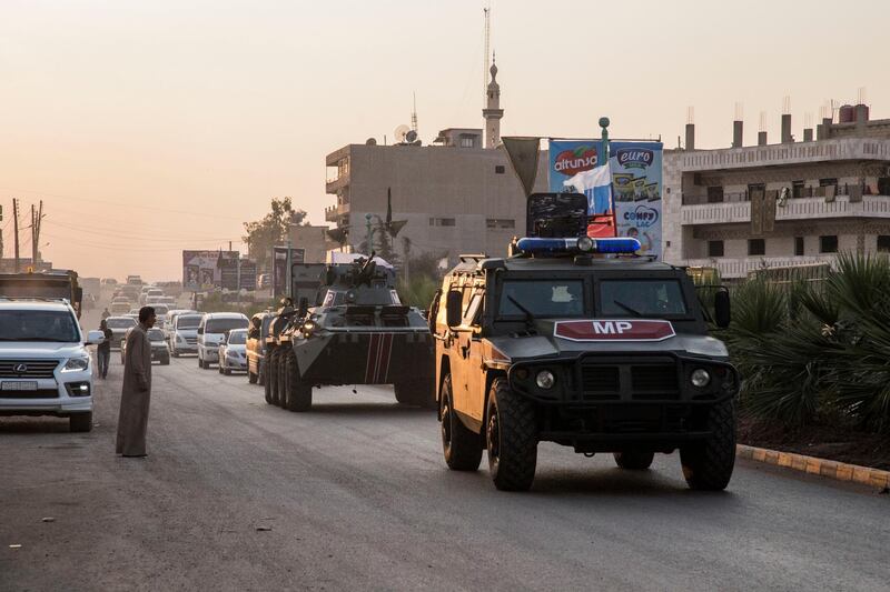 Russian forces patrol in the city of Amuda. AP Photo