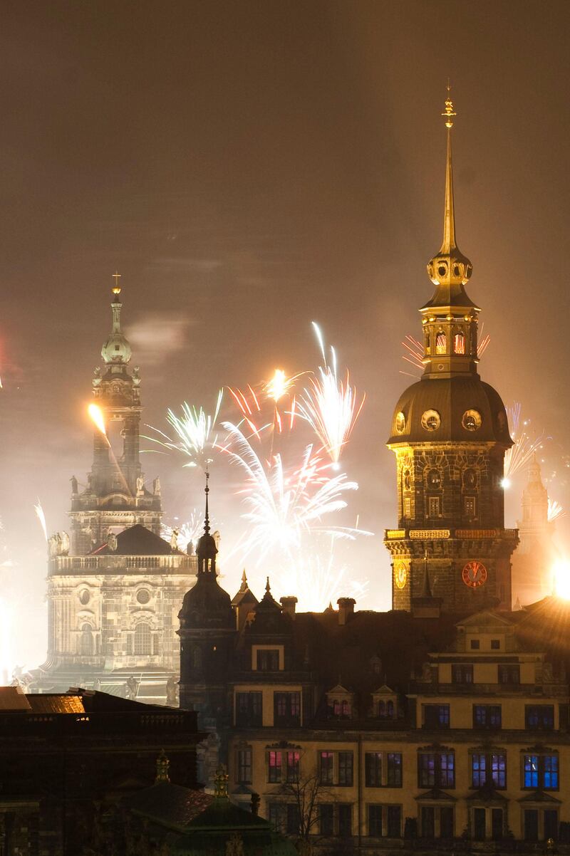 Fireworks explode to welcome the new year on January 1, 2012 in Dresden, eastern Germany. Extravagant firework displays lit up the skies from Sydney to New York in a global New Year's party as people around the world set aside their worries to welcome 2012.    AFP PHOTO / SEBASTIAN KAHNERT    GERMANY OUT
 *** Local Caption ***  560572-01-08.jpg