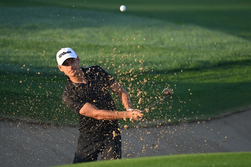Joakim Lagergren of Sweden hits his third shot on the 2nd hole at Emirates Golf Club. Getty Images