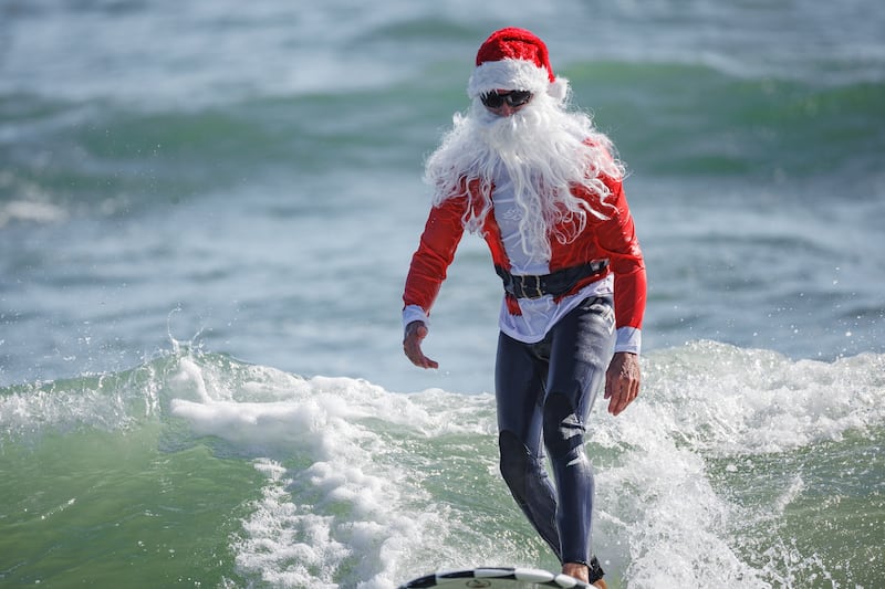The annual Santa Claus surf event takes place at Cocoa Beach, Florida. Reuters