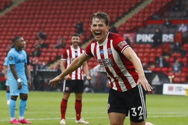 epa08523404 Sander Berge of Sheffield celebrates after scoring the 1-0 lead during the English Premier League soccer match between Sheffield United and Tottenham Hotspur in Sheffield, Britain, 02 July 2020. EPA/Jason Cairnduff/NMC/Pool EDITORIAL USE ONLY. No use with unauthorized audio, video, data, fixture lists, club/league logos or 'live' services. Online in-match use limited to 120 images, no video emulation. No use in betting, games or single club/league/player publications.