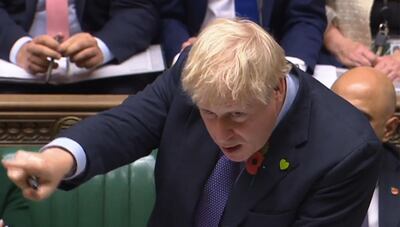 A video grab from footage broadcast by the UK Parliament's Parliamentary Recording Unit (PRU) shows Britain's Prime Minister Boris Johnson as he speaks during the weekly Prime Minister's Questions session (PMQs) in the House of Commons in London on October 30, 2019. Britain's political leaders tested their election pitches on October 30 after parliament backed Prime Minister Boris Johnson's bid for a pre-Christmas poll aimed at breaking the lengthy Brexit deadlock. - RESTRICTED TO EDITORIAL USE - MANDATORY CREDIT " AFP PHOTO / PRU " - NO USE FOR ENTERTAINMENT, SATIRICAL, MARKETING OR ADVERTISING CAMPAIGNS
 / AFP / PRU / HO / RESTRICTED TO EDITORIAL USE - MANDATORY CREDIT " AFP PHOTO / PRU " - NO USE FOR ENTERTAINMENT, SATIRICAL, MARKETING OR ADVERTISING CAMPAIGNS
