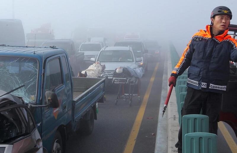 The foggy conditions meant drivers could only see 15 meters (50 feet) in front of them, he said, adding that 63 people, including 18 foreigners, were injured. James Park / EPA