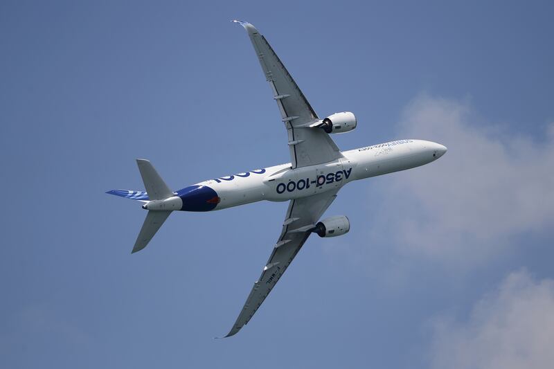 An Airbus A350-1000 aircraft participates in a fly-by during the Singapore Airshow 2022.  AP