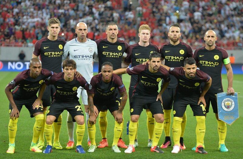 Manchester City's team poses prior the match. (AFP)