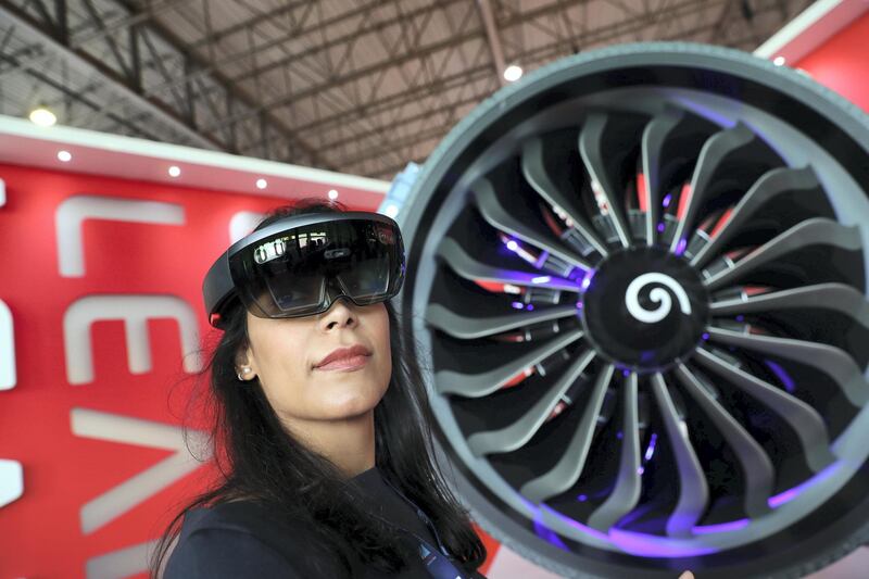 Dubai, United Arab Emirates - November 14th, 2017: Fatma Al-Suwaidan at the CFM stand where she uses interactive glasses to find out info at the Dubai airshow. Tuesday, November 14th, 2017 at Al Maktoum Airport, Dubai. Chris Whiteoak / The National