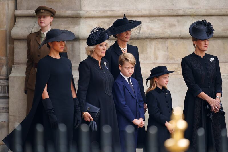 From left, Meghan, Duchess of Sussex; Camilla, the Queen Consort; Prince George; Catherine, Princess of Wales; Princess Charlotte and Sophie, Countess of Wessex, leave Westminster Abbey. PA