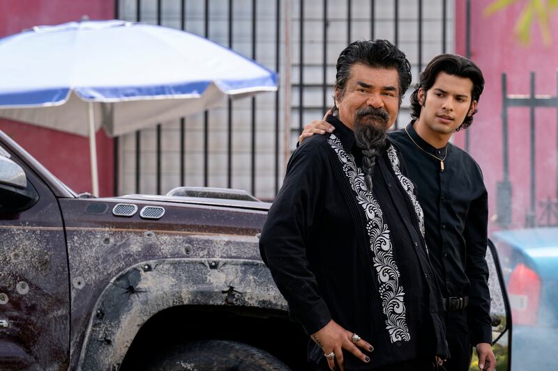 George Lopez as Uncle Rudy and Xolo Mariduena as Jamie Reyes