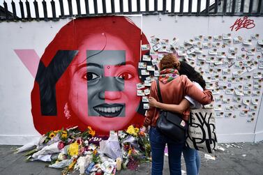 Two women console one another as they look at notes left on a mural of Savita Halappanavar in Dublin on May 26, 2018 as Ireland counted votes from a referendum to repeal a ban on abortion. Charles McQuillan / Getty Images