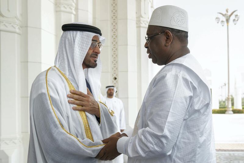 ABU DHABI, UNITED ARAB EMIRATES - February 06, 2021: HH Sheikh Mohamed bin Zayed Al Nahyan Crown Prince of Abu Dhabi Deputy Supreme Commander of the UAE Armed Forces (L) receives HE Macky Sall, President of Senegal (R), during an official visit reception, at Qasr Al Watan.


( Hamad Al Mansoori for the Ministry of Presidential Affairs )
---