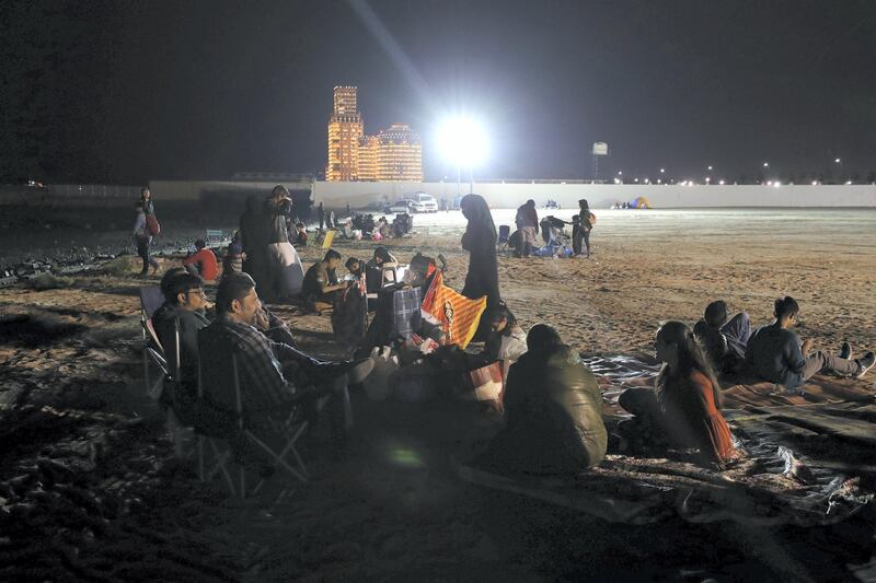 Ras Al Khaimah, United Arab Emirates - Reporter: N/A: People arrive at the beach as Ras Al Khaimah puts on a record-breaking fireworks display on New Year's Eve. Tuesday, December 31st, 2019. Al Hamra, Ras Al Khaimah. Chris Whiteoak / The National