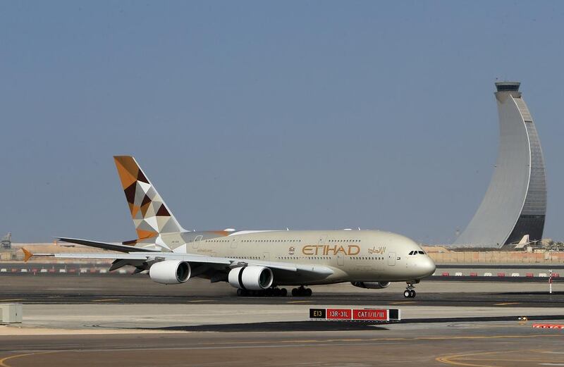 Etihad, Boeing, Masdar and Adnoc set out a plan for actions needed to produce zero-carbon fuel. Ravindranath K / The National