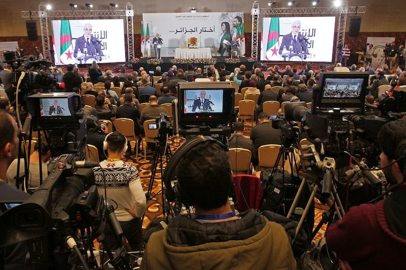 The head of the National Independent Electoral Authority, Mohamed Charfi, speaks during a news conference to announce the results of Algeria's presidential election in Algiers. AP
