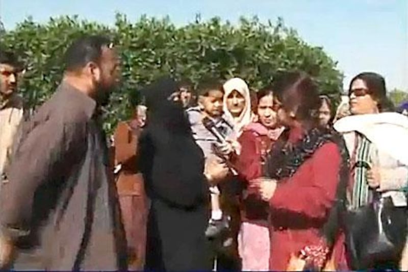 Maya Khan, (right, in red) was host of one of Pakistan´s most popular morning shows until she led a group into a park trying to expose couples hanging out together.