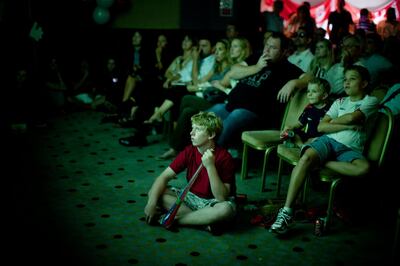 Abu Dhabi - June 27, 2010: Fans watch England be defeated by Germany during a World Cup match at the British Club . Lauren Lancaster / The National?