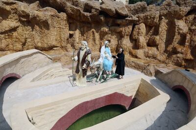 Biblical sculptures placed near the well at the Virgin Mary tree. EPA
