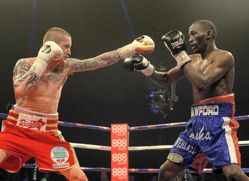 GLASGOW, SCOTLAND - MARCH 1 : Ricky Burns and Terence Crawford clash during the WBO World Lightweight Championship Boxing match at the Glasgow SECC on March 1 2014 in Glasgow, Scotland. (Photo by Mark Runnacles/Getty Images)
