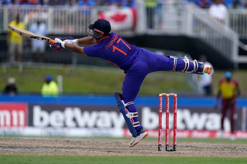 India's Rishabh Pant reaches out to hit a boundary. AP