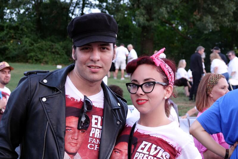 Luis Enrique Gonzalez and Elsa Velazquez, who travelled from Puerto Rico, joins mourners who gathered to commemorate the 40th anniversary of the death of singer Elvis Presley at his former home of Graceland, in Memphis, Tennessee. Karen Pulfer Focht / Reuters