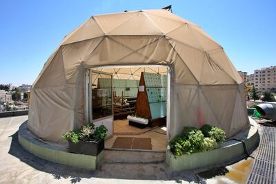 The Green Hub is located on the rooftop of Amman's Landmark Hotel and houses an ecosystem of plants and fish. Photo by Charlie Faulkner