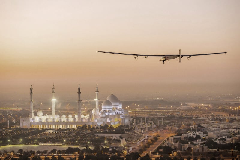 Sheikh Zayed Grand Mosque in Abu Dhabi provides a spectacular backdrop to an early morning test flight before 'Solar Impulse 2' embarked on its round-the-world attempt on March 9, 2015.