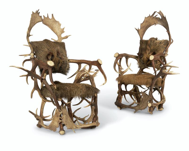 Lot 263: pair of antler throne chairs. Photo: Dreweatts