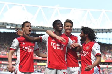 Eddie Nketiah (C) of Arsenal celebrates with teammates after scoring the opening goal during the English Premier League soccer match between Arsenal FC and Leeds United in London, Britain, 08 May 2022.   EPA/VINCE MIGNOTT EDITORIAL USE ONLY.  No use with unauthorized audio, video, data, fixture lists, club/league logos or 'live' services.  Online in-match use limited to 120 images, no video emulation.  No use in betting, games or single club / league / player publications