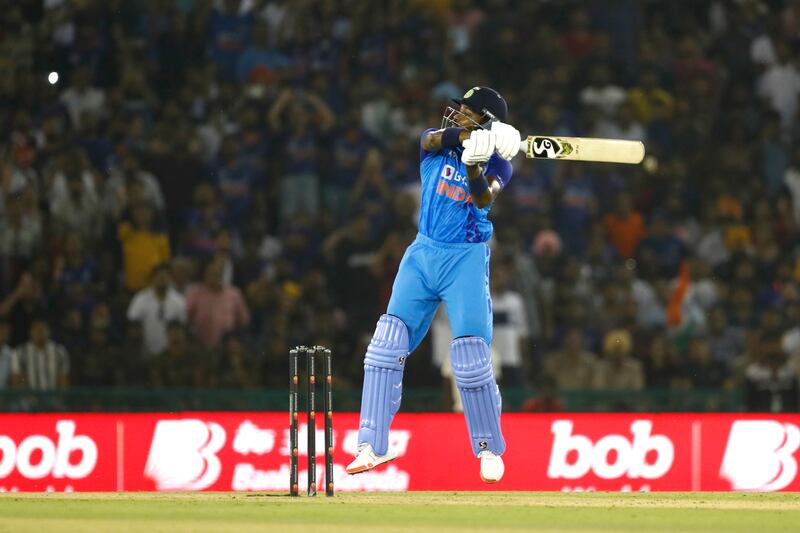 Hardik Pandya hits a boundary in Mohali. Getty