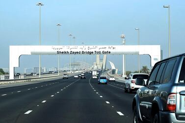 Drivers will not have to pay for passing through Abu Dhabi's four road toll gates until January 1. Victor Besa / The National