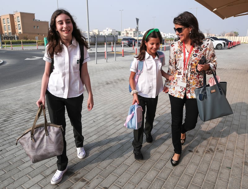 Gabriela  Rotter Sekef and Isabella Pauli arrive
at Raha International School Abu Dhabi. Victor Besa / The National