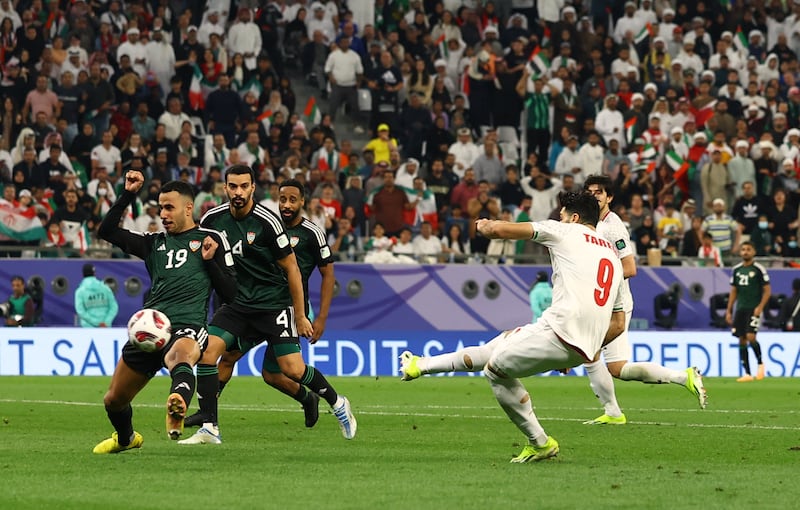 Iran's Mehdi Taremi scores their second goal. Reuters