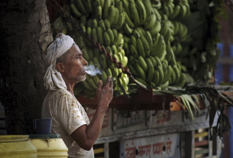 Most of the tobacco consumed in India is either hand-rolled, such as bidis, or illegally imported cigarettes, which means that it is not taxed. Rajesh Kumar Singh / AP Photo