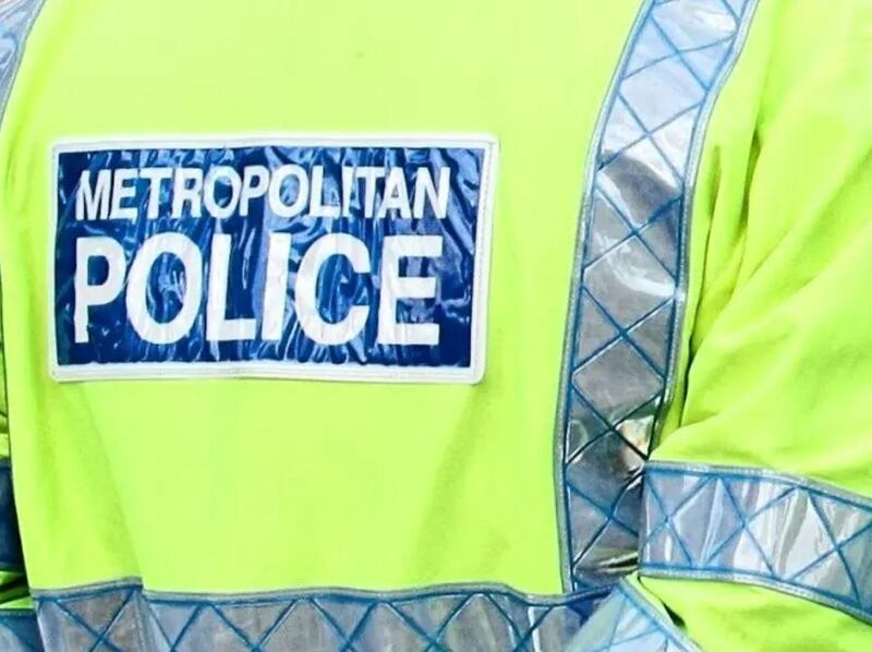 Police reported a man was firing a machinegun from a balcony. Metropolitan Police