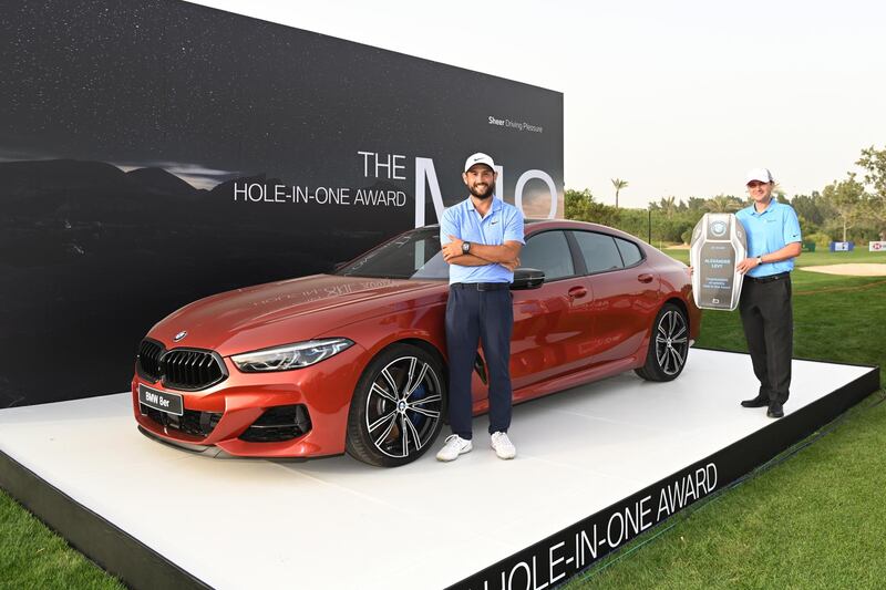 Alexander Levy poses for a photograph as he is presented with the BMW hole in one award during Day Three of the Abu Dhabi HSBC Championship. Getty Images