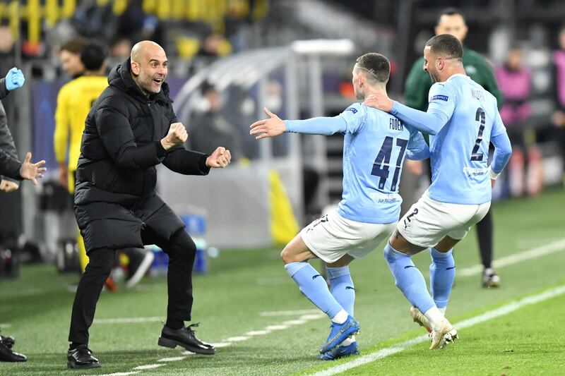 File photo dated 14-04-2021 of Manchester City manager Pep Guardiola celebrates with goal scorer Phil Foden and Kyle Walker (right) after their second goal during the UEFA Champions League, quarter final, second leg match at Signal Iduna Park in Dortmund, Germany. Issue date: Wednesday May 26, 2021. PA Photo. We take a look at Manchester City's route to the Champions League final as they prepare to face Chelsea on May 29th. See PA Story SOCCER Champions League Man City Route. Photo credit should read: PA Wire via DPA/PA Wire